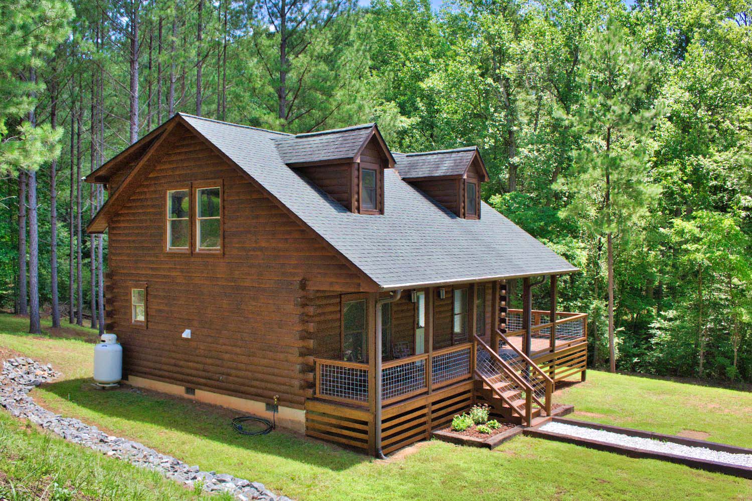 MLS # 4283344 | 2.00 acres | New log cabin w/stream in gated Hearthstone Ridge