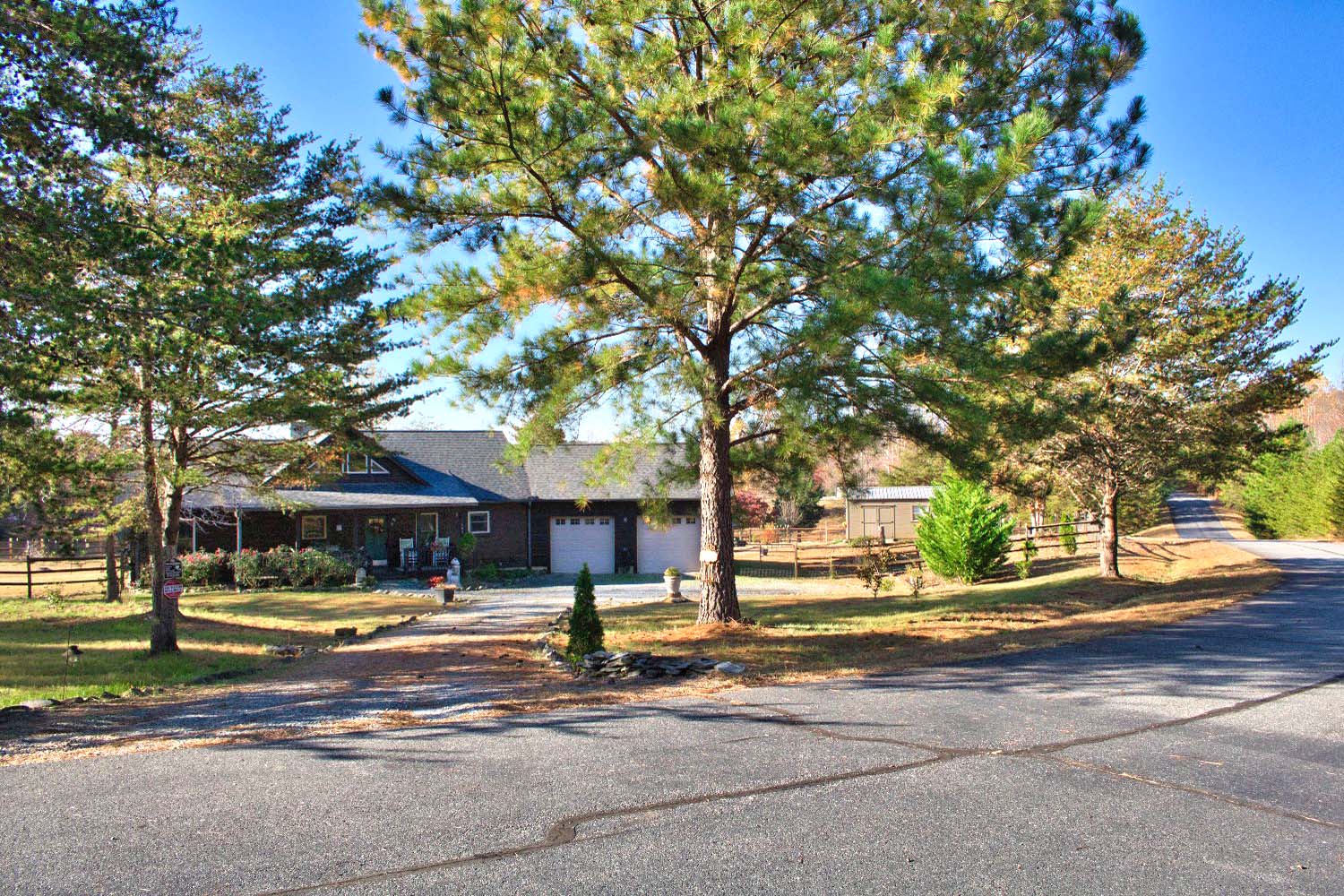 MLS # 4319903 | 2.55 acres | New log cabin w/barn in gated Hearthstone Ridge